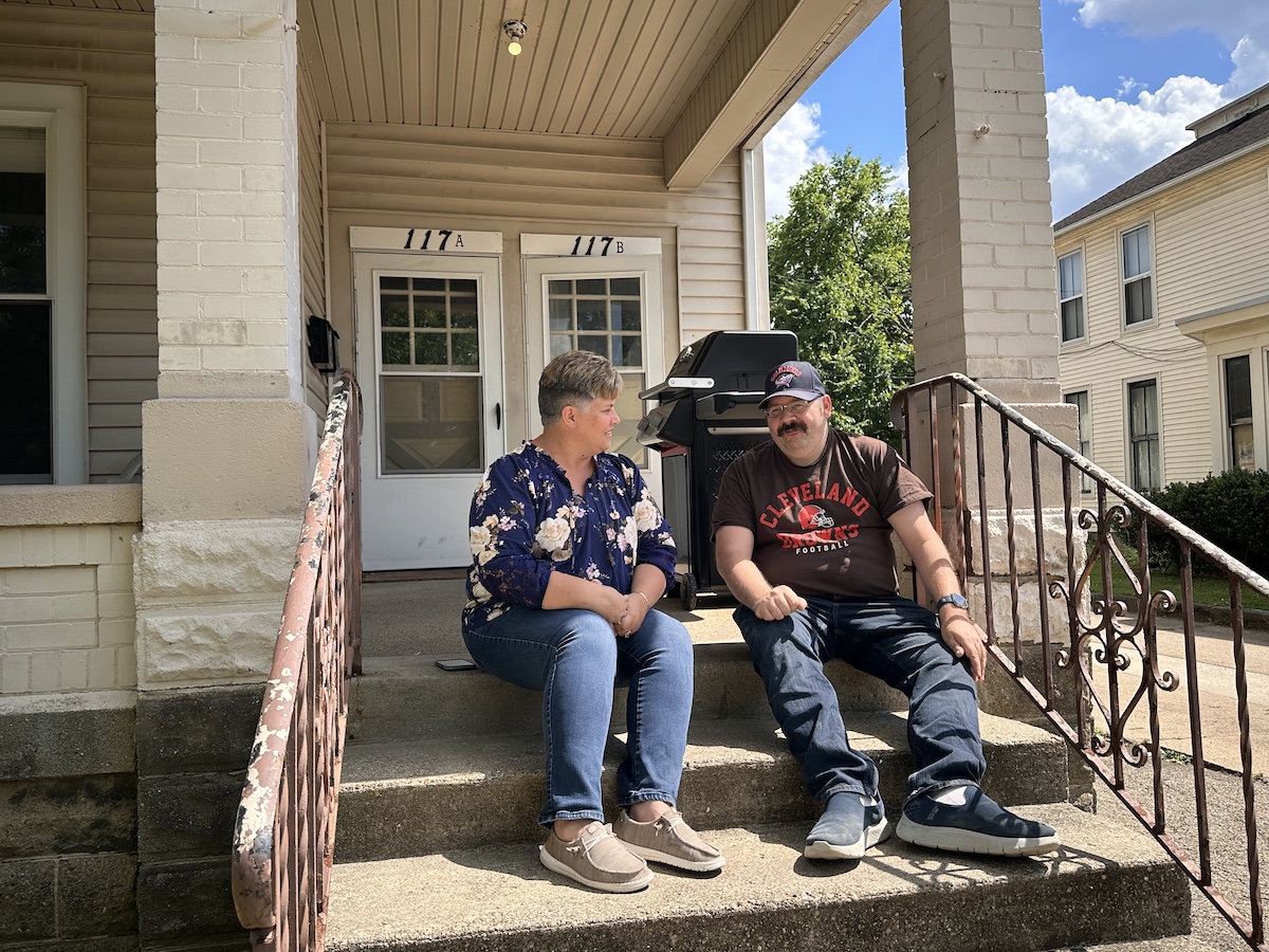 Kristy and Bill sitting on front steps Kristy and Bill sitting on front steps