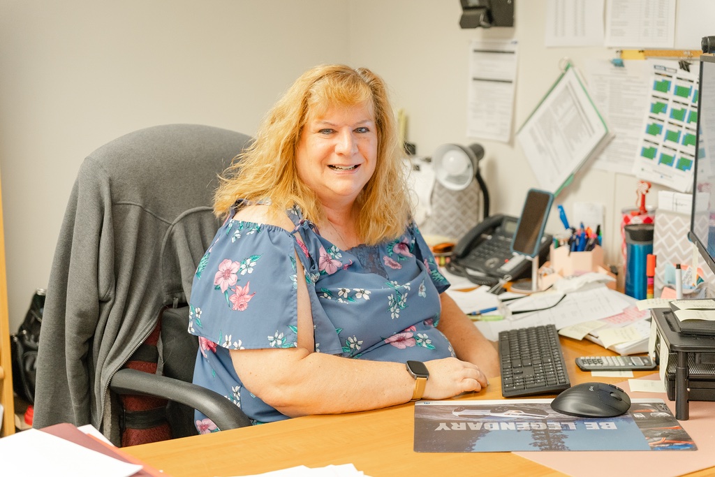 Vicki at her desk
